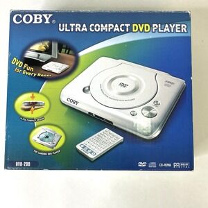 Coby Ultra Compact DVD Player Model: DVD-209 Silver‎ Brand New Open Box Complete